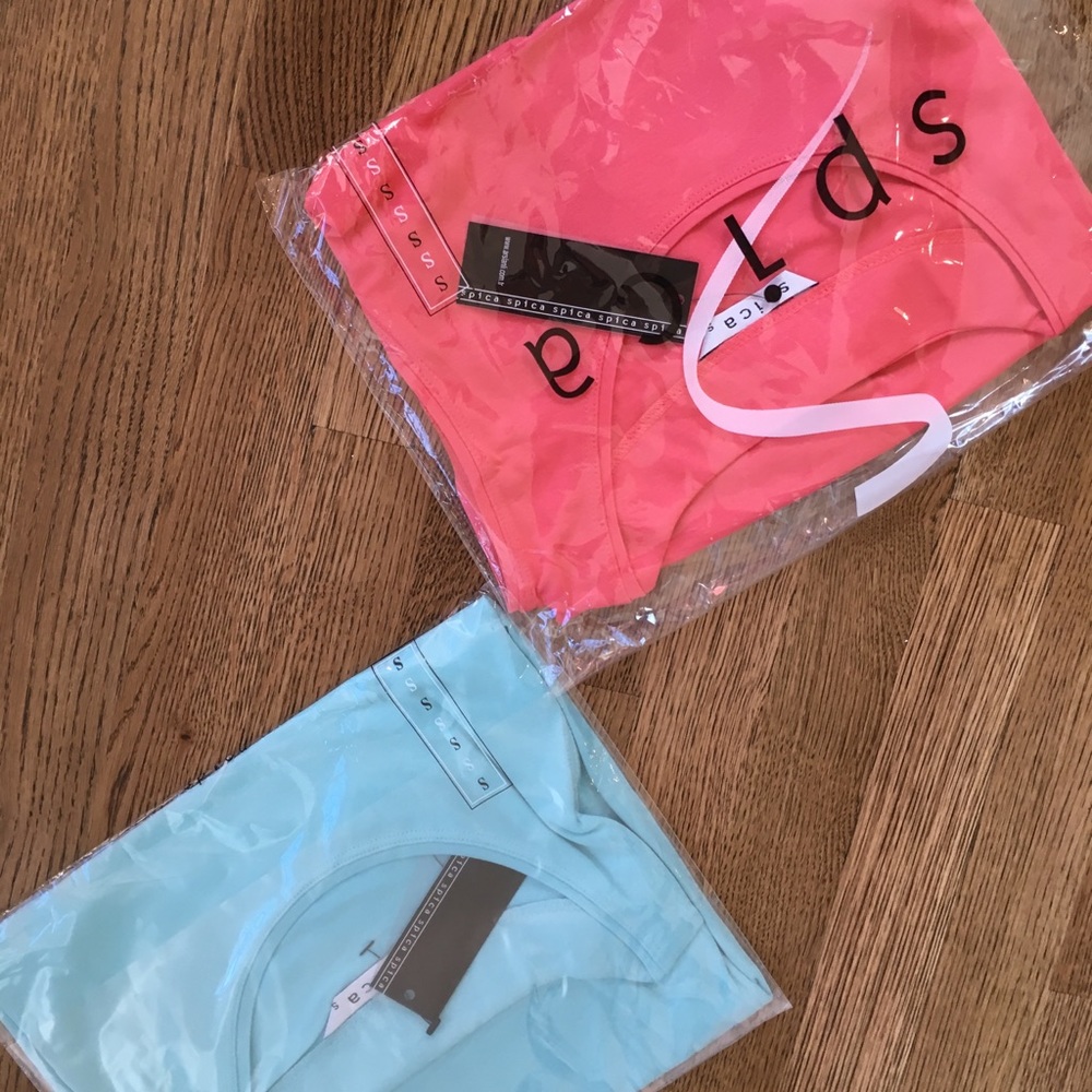 NWT 2 Sleeveless T-shirts.